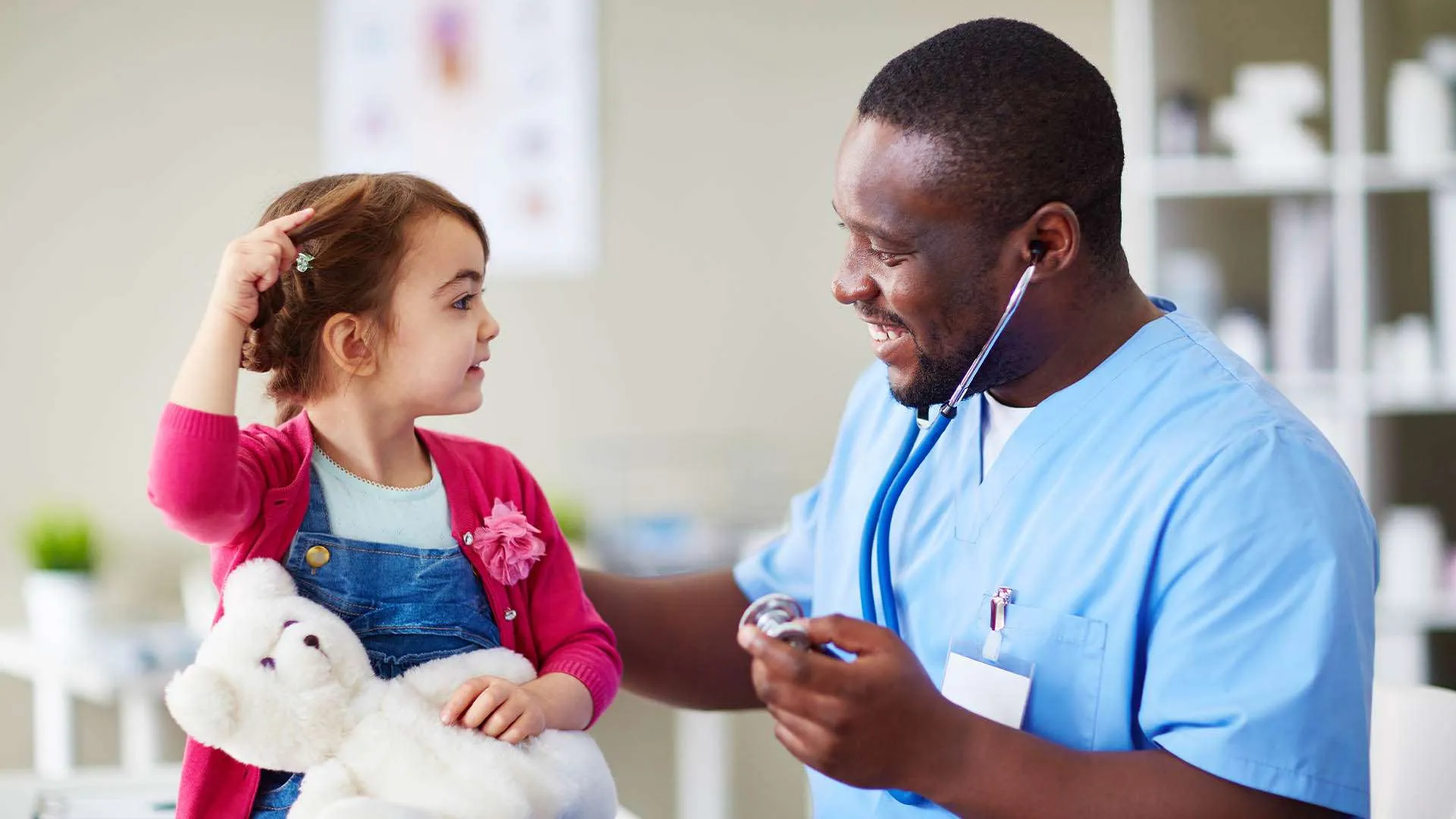 A doctor with a young patient